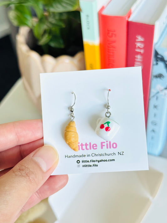 Handmade polymer clay matcha and croissant earrings NZ, mismatched food jewelry