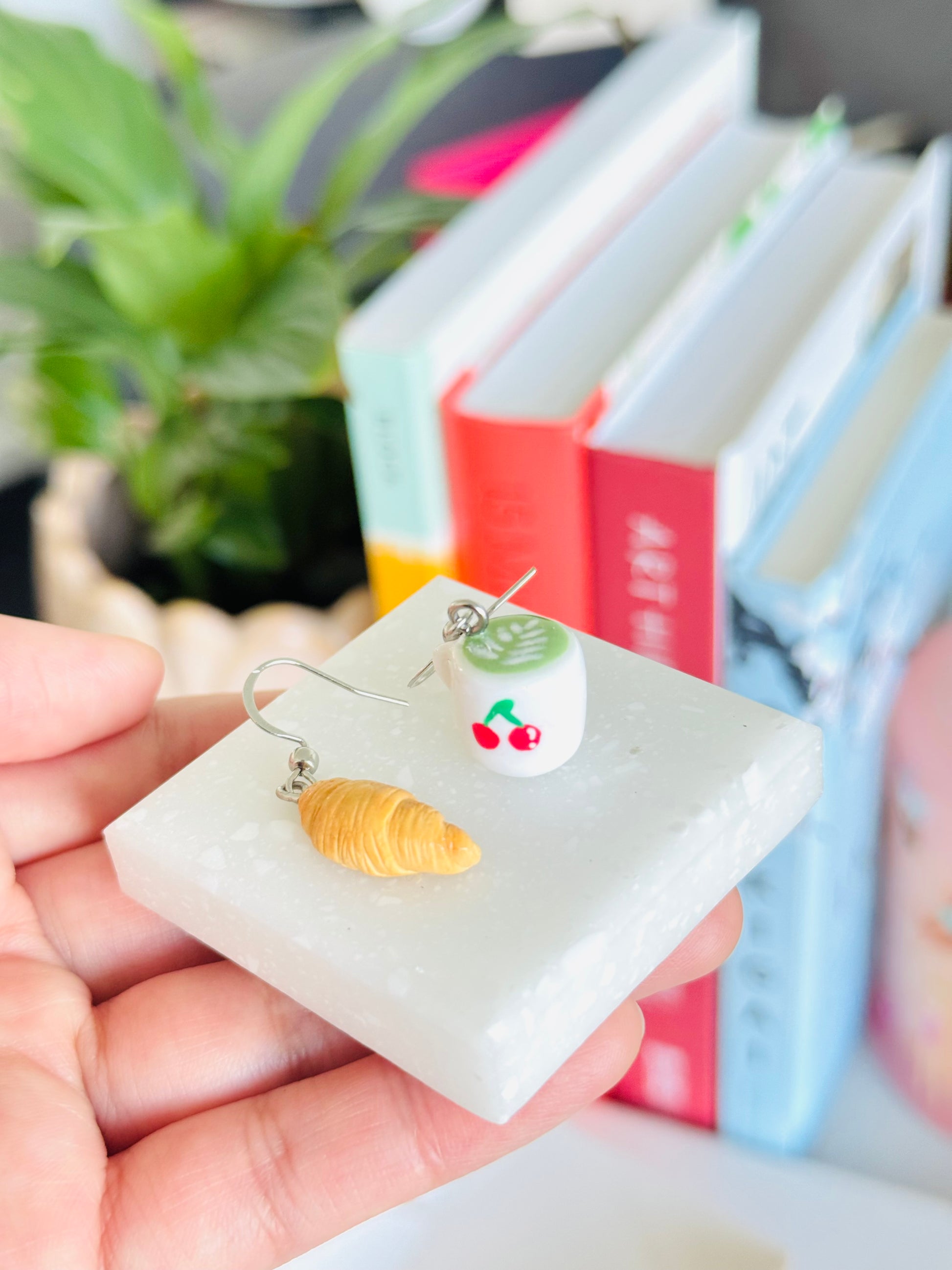 Handmade polymer clay matcha and croissant earrings NZ, mismatched food jewelry