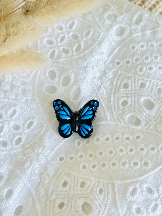 Handmade polymer clay butterfly brooch with colourful wings, nature-inspired pin