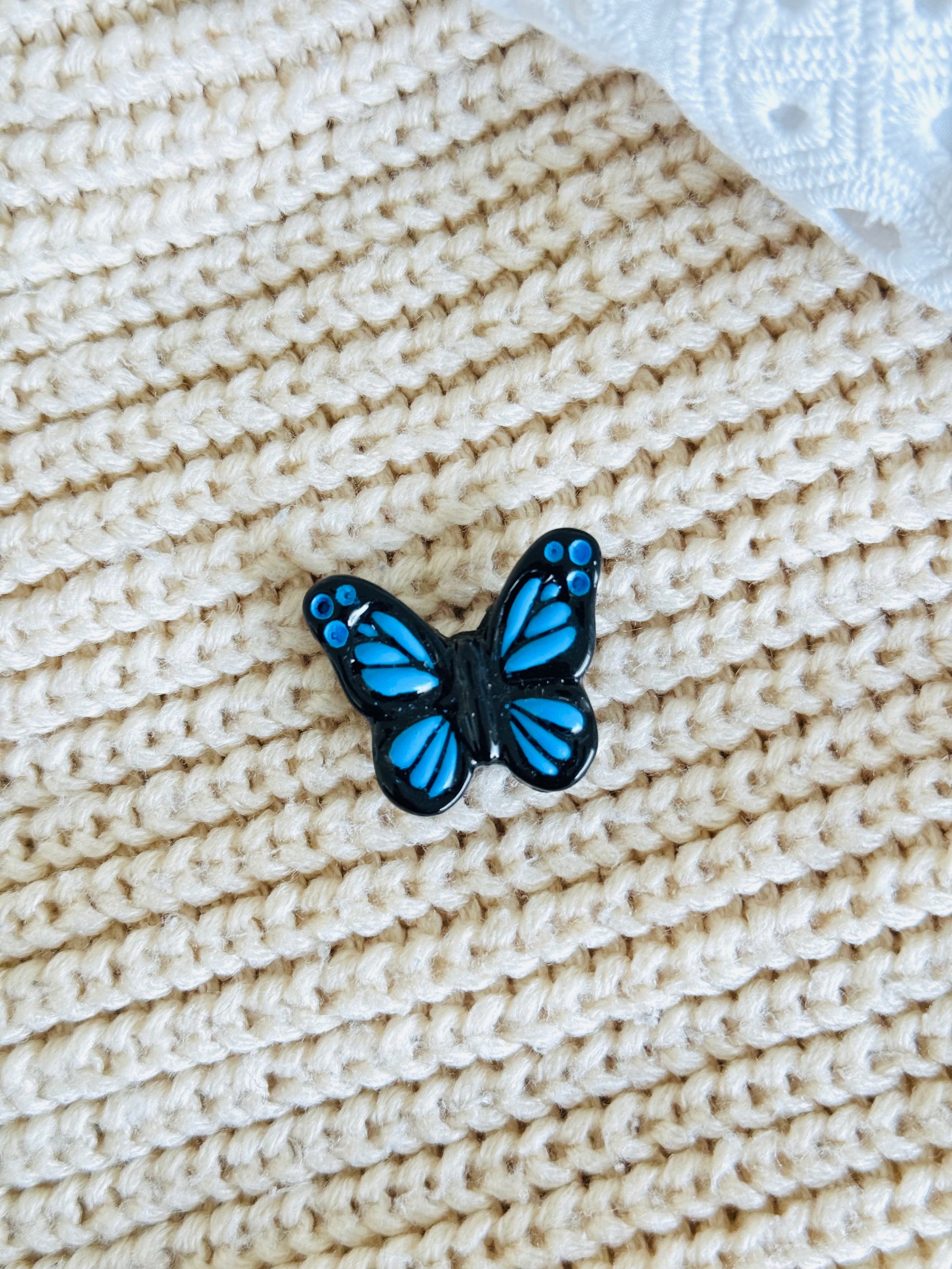 Handmade polymer clay butterfly brooch with colourful wings, nature-inspired pin
